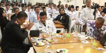 Kapolres Simalungun berbincang dengan Bupati