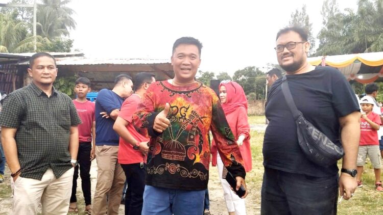 Ronald Tapubolon didampingi tim