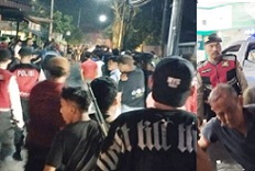 Kepolisan saat berada di lokasi bentrok dan korban