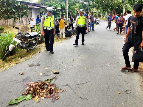 Personel Sat Lantas Polres Simalungun lakukan olah TKP