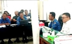 Simon Tarigan dan Suhendra Ginting berkemeja ASN