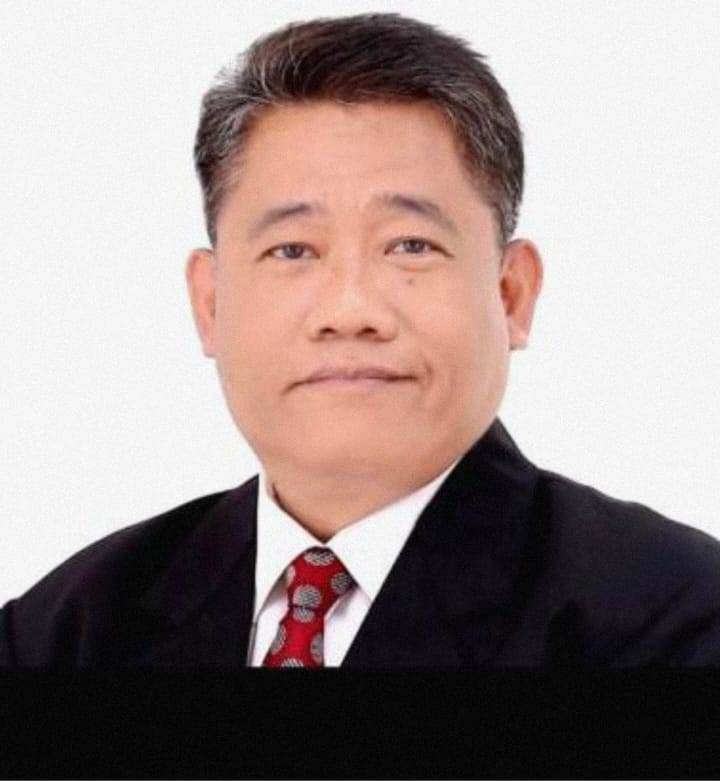 Dr Henry Sinaga