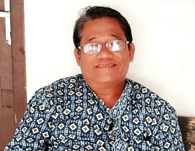 Dr Henry Sinaga