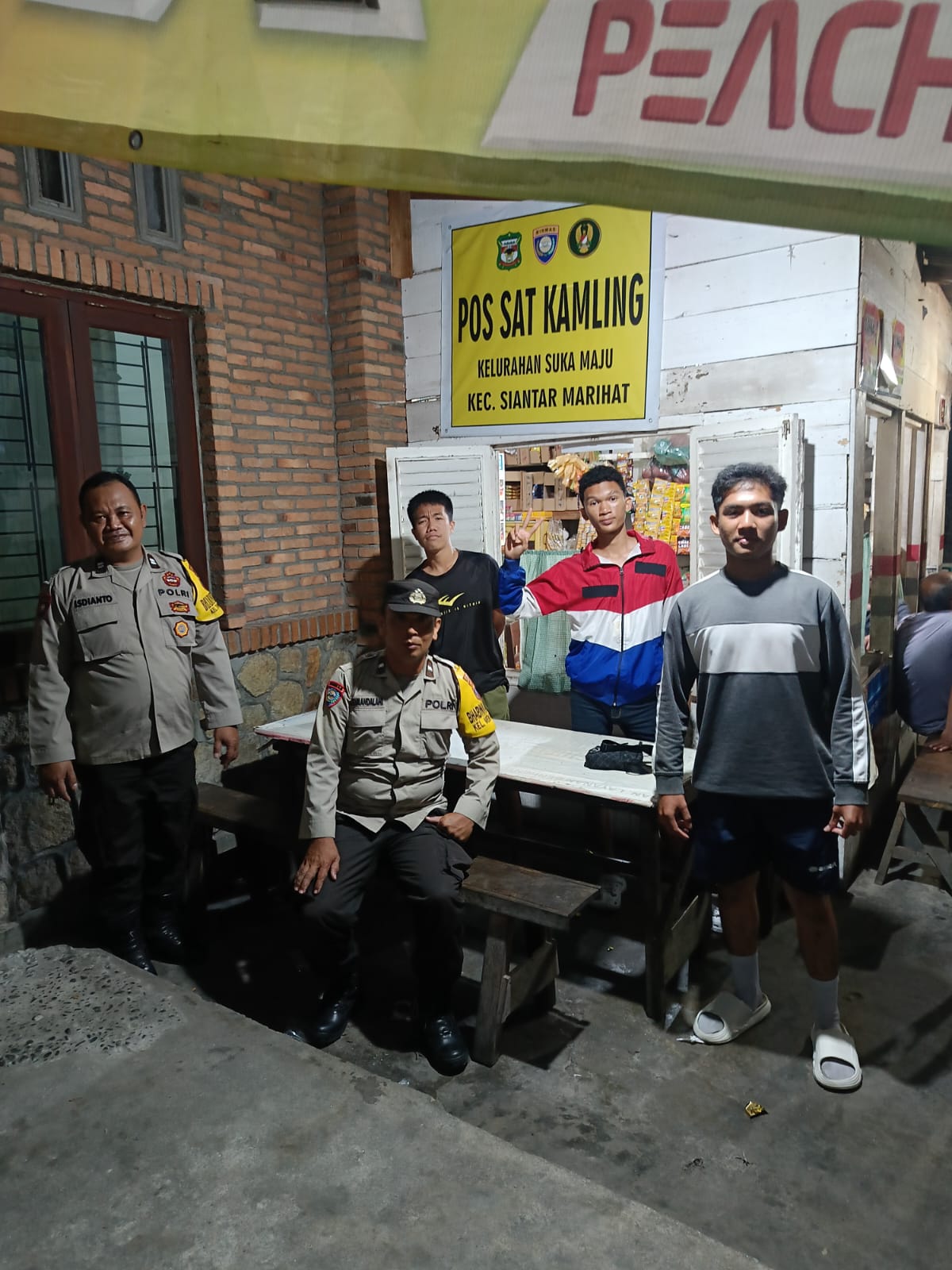 Perkuat Siskamling, Bhabinkamtibmas Polsek Siantar Marihat Ajak Warga Tingkatkan Kewaspadaan