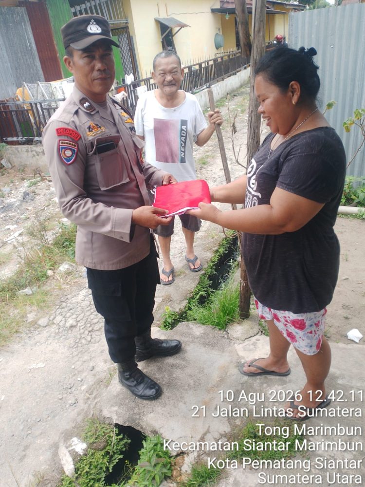 Jelang HUT RI ke-81, Kapolsek Siantar Marihat Gerakkan Warga Kibarkan Merah Putih