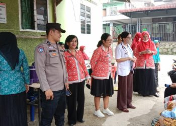 Perkuat Kedekatan dengan Warga, Bhabinkamtibmas Siantar Barat Dampingi Pelayanan Posyandu