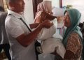 Pastikan Tepat Sasaran, Pangulu Naga Jaya II Pantau Distribusi Bantuan Pangan