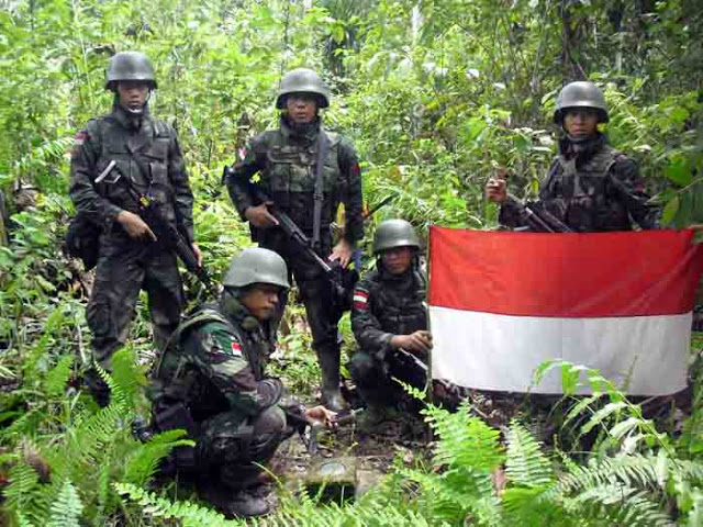 TNI Patroli Pengamanan Patok Perbatasan RI-PNG