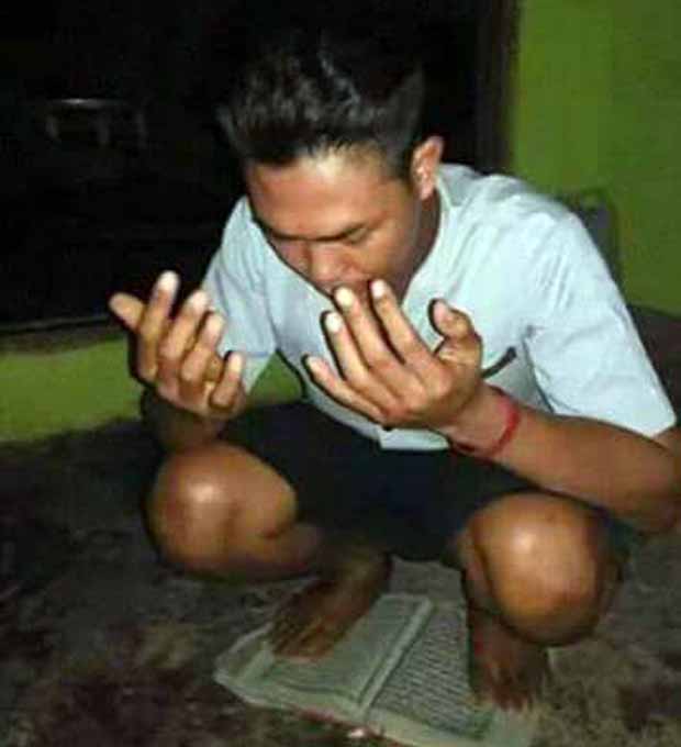 Unggah Foto Injak Quran di Facebook, Pemilik Akun “Agung LaEh” Serahkan Diri ke Polres
