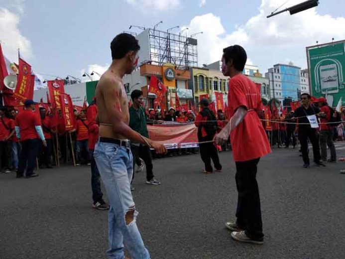 May Day di Bandarlampung, Para Buruh Tuntut Pembebasan Daryati dari Hukuman Mati