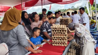 Asisten Ekobang Setdakab Lampung Selatan Buka Operasi Pasar Murah di Kecamatan Katibung