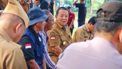 Gubernur Arinal Djunaidi Tebar Benih Ikan di Dam Raman Metro