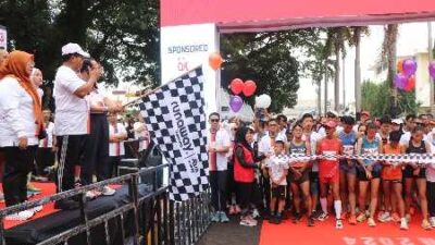 Gencarkan Literasi Keuangan, Penjabat Gubernur Lampung Lepas Peserta GENCARKAN Run 2024