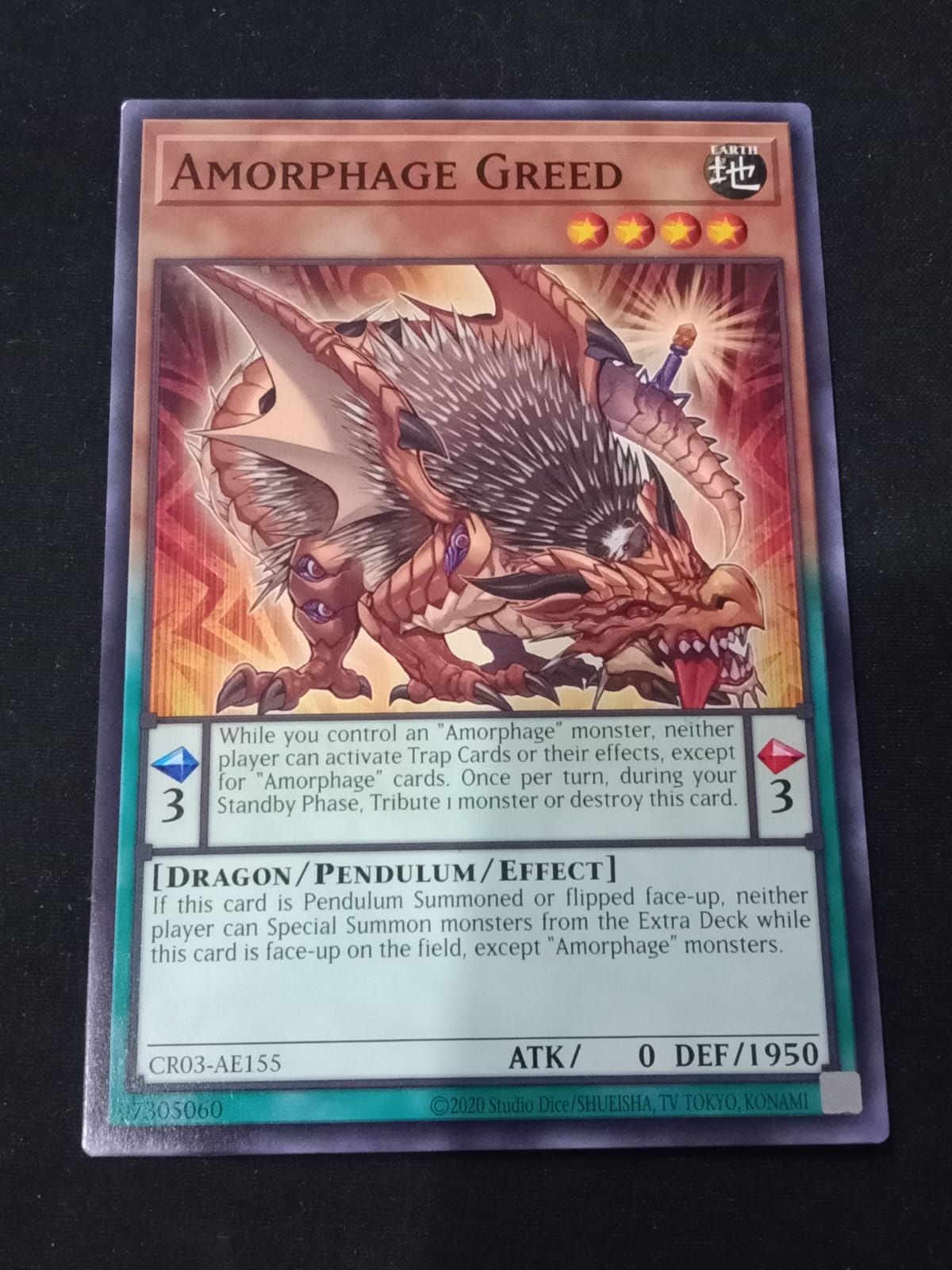CR03-AE155 Amorphage Greed Common