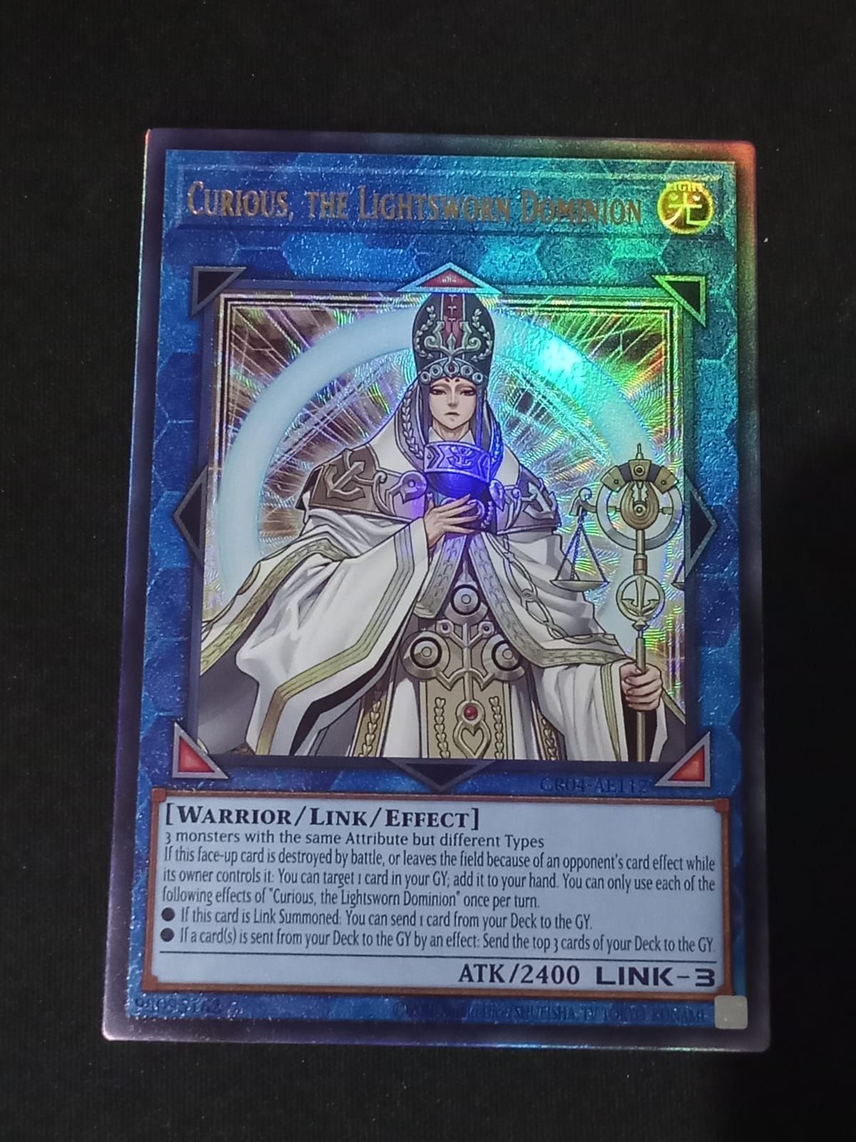 CR04-AE112 Curious, the Lightsworn Dominion Ultimate Rare
