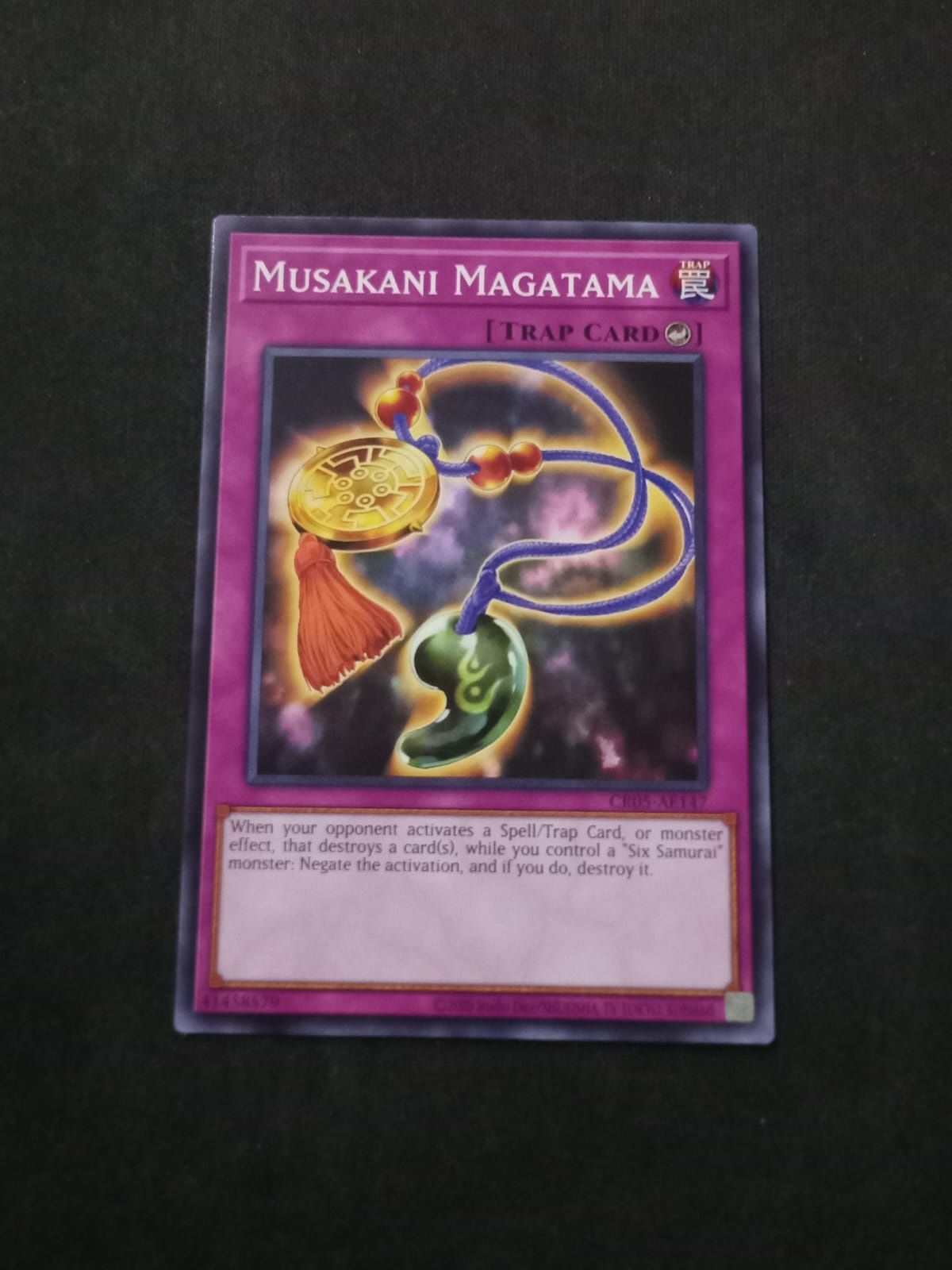 CR05-AE147 Musakani Magatama Common