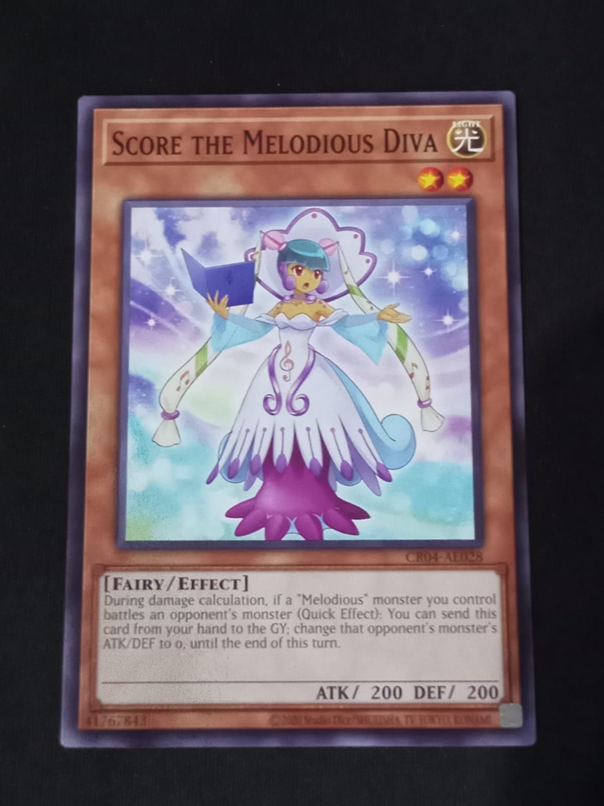 CR04-AE028 Score the Melodious Diva Common