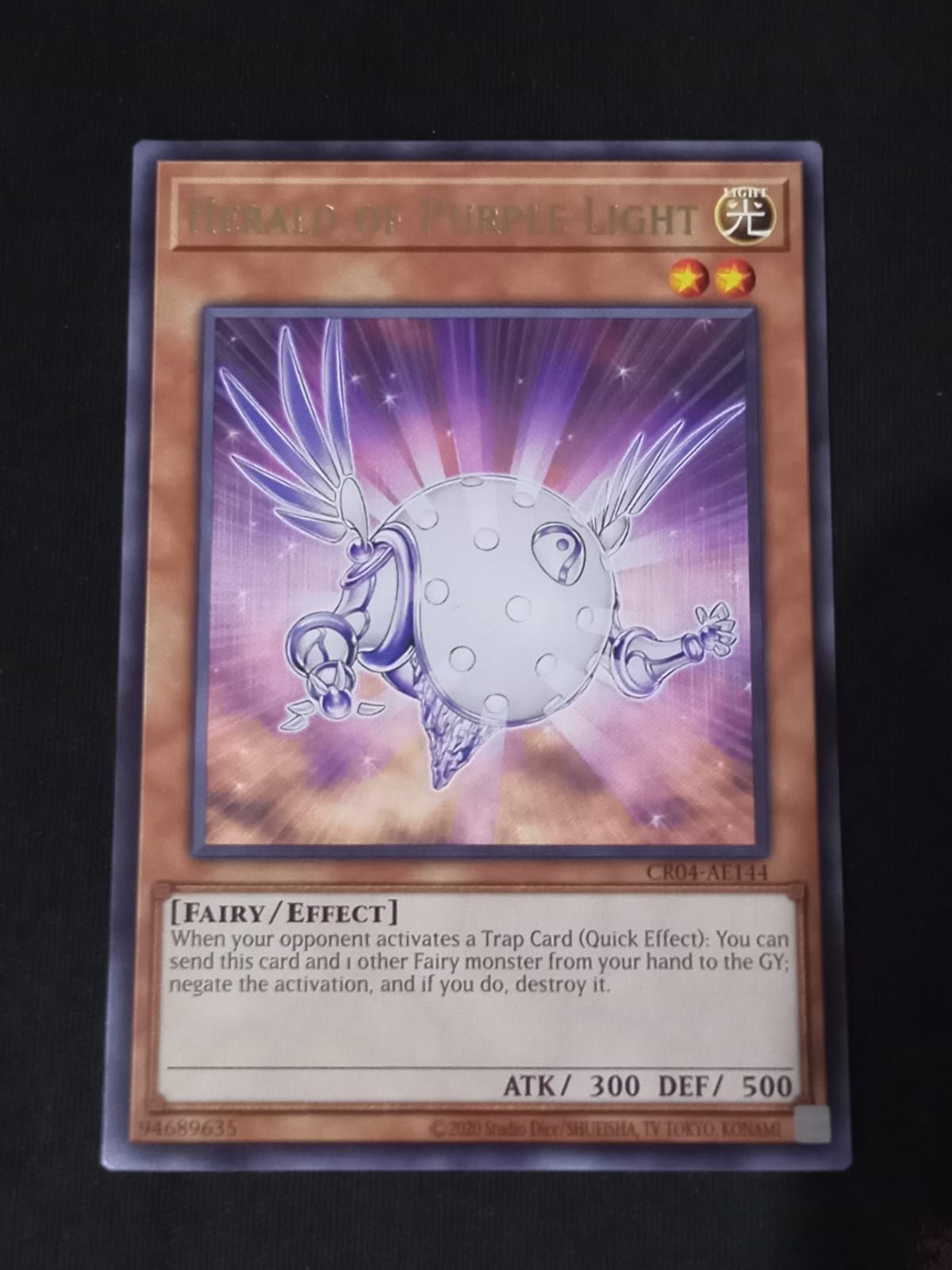 CR04-AE144 Herald of Purple Light Rare