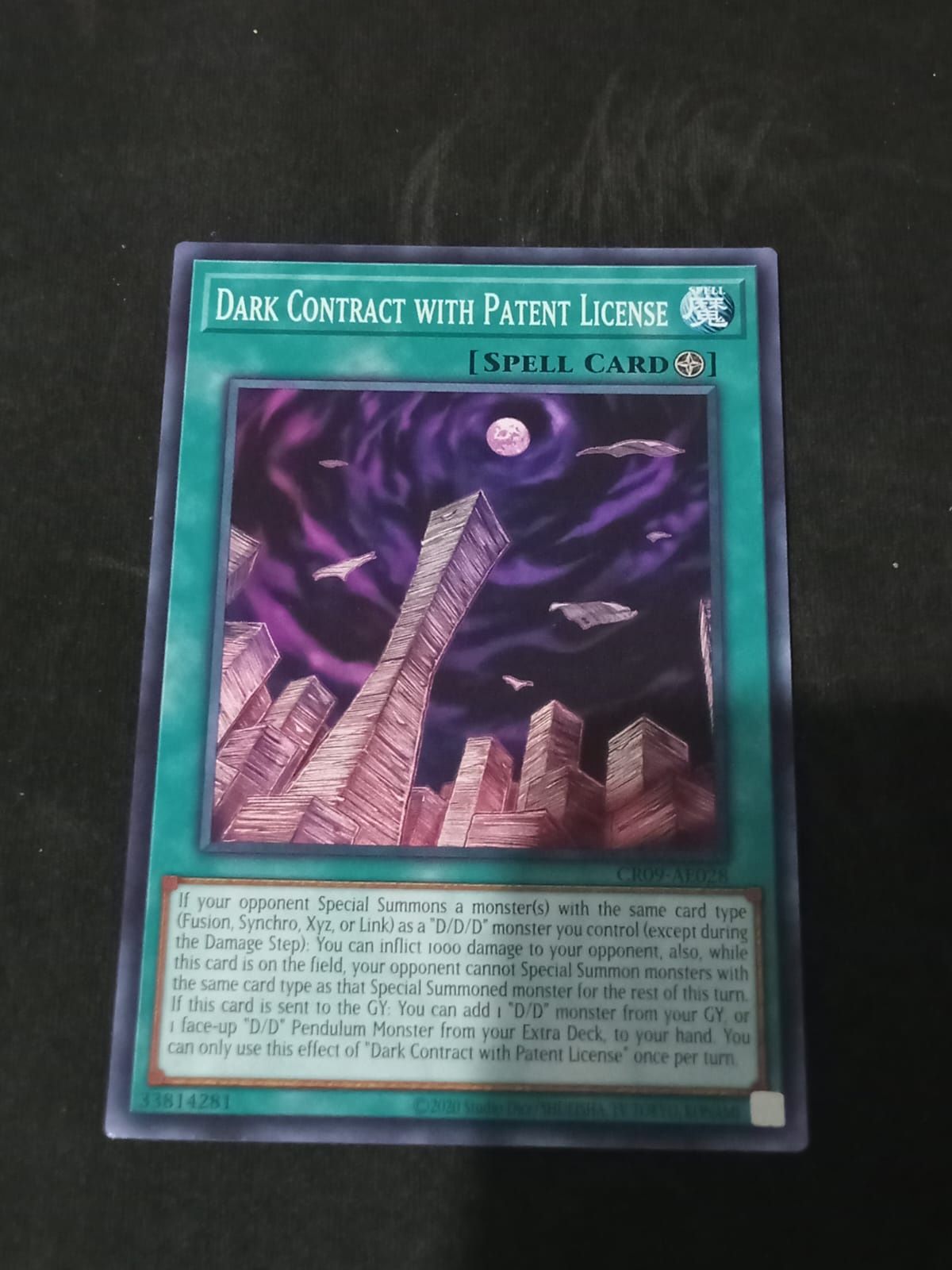 CR09-AE028 Dark Contract with Patent License Common