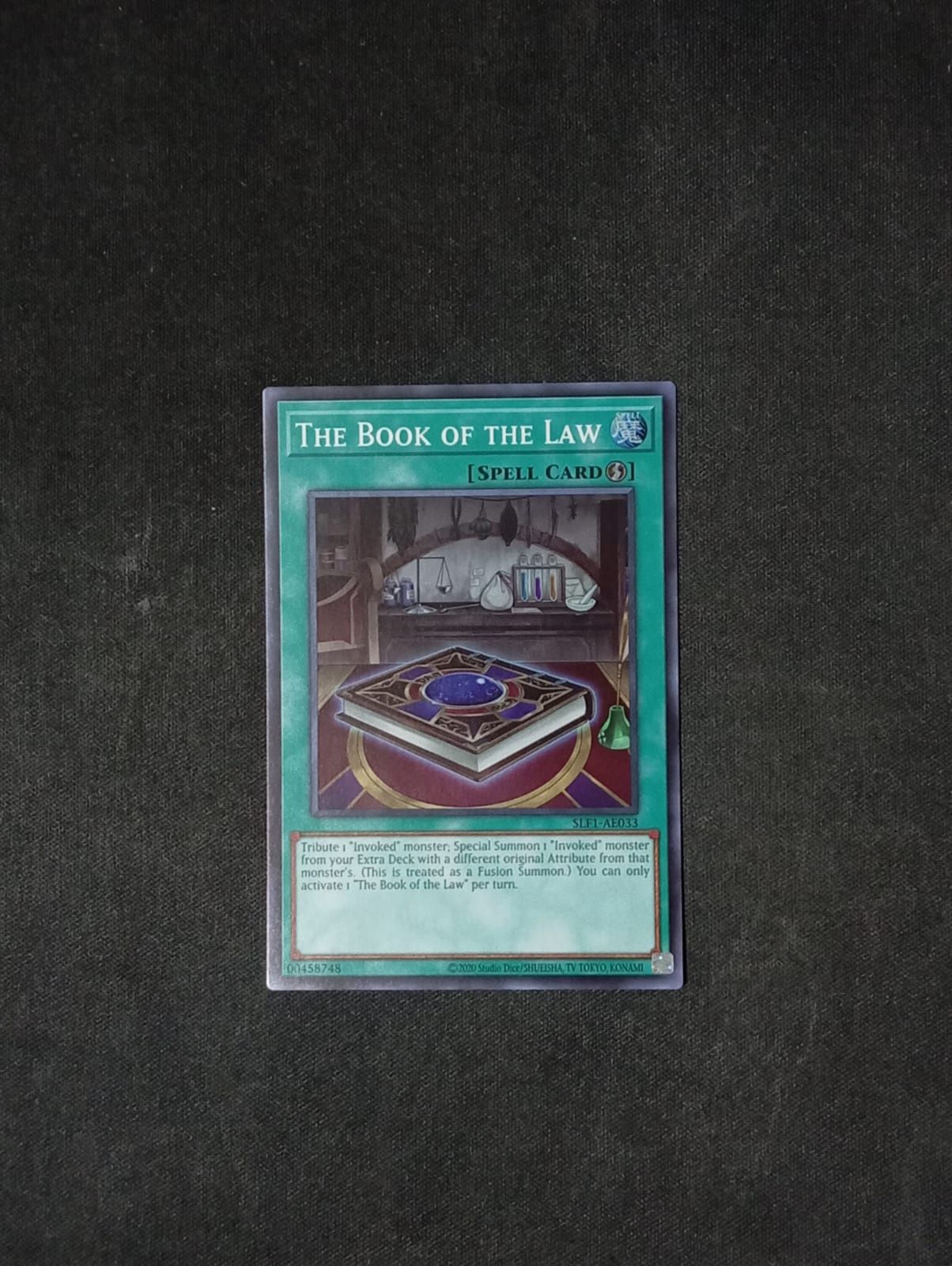 SLF1-AE033 The Book of the Law
Super Rare